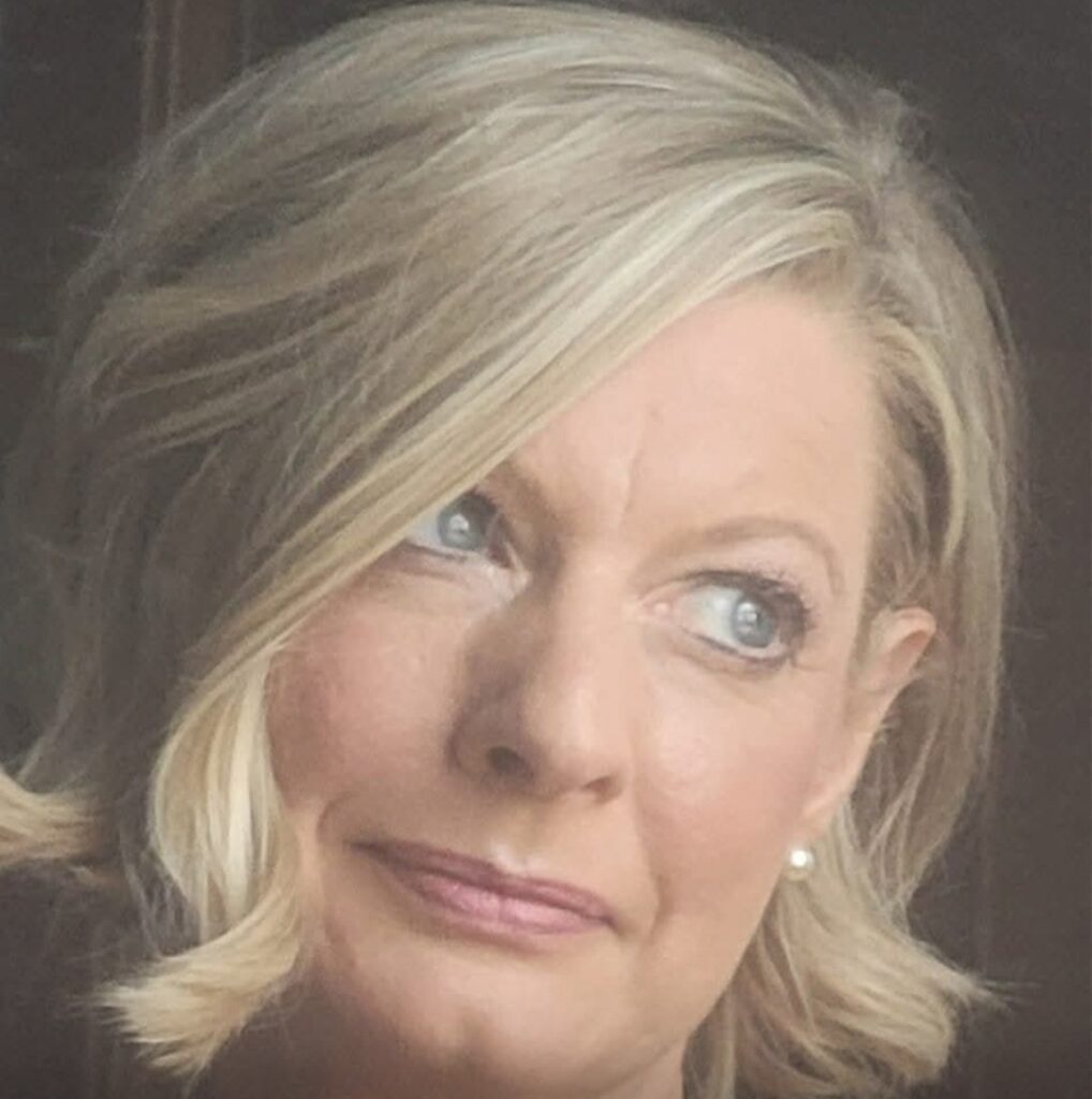 About sarah headshot 2024